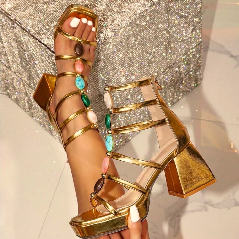 Chunky Gold heels with stone accents